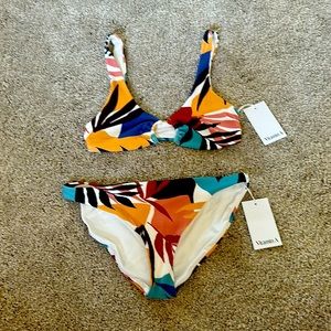 Beautiful, Vitamin A swimsuit! The colors are absolutely gorgeous! Size 8/M